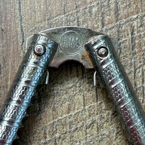 Antique HMQ‎ Nutcracker Pair Ornate Embossed Handles Victorian